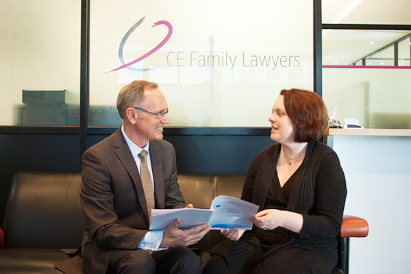 Warren Howard with Jane Libbis at CE Family Lawyers during an executive strategy session